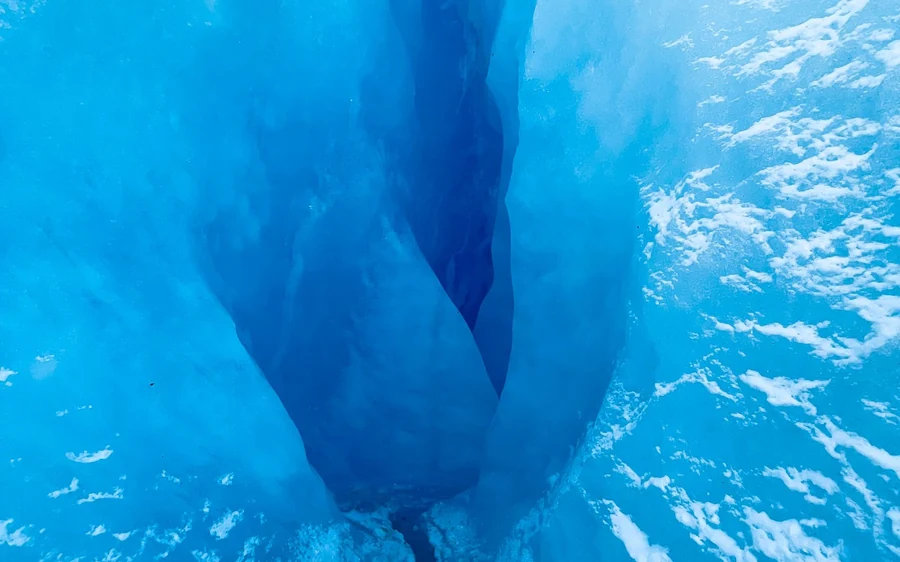 A small group on a long trek across the upper ice of the Perito Moreno Glacier